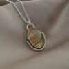 Handgemaakte zilveren ketting met dendrietagaat hanger